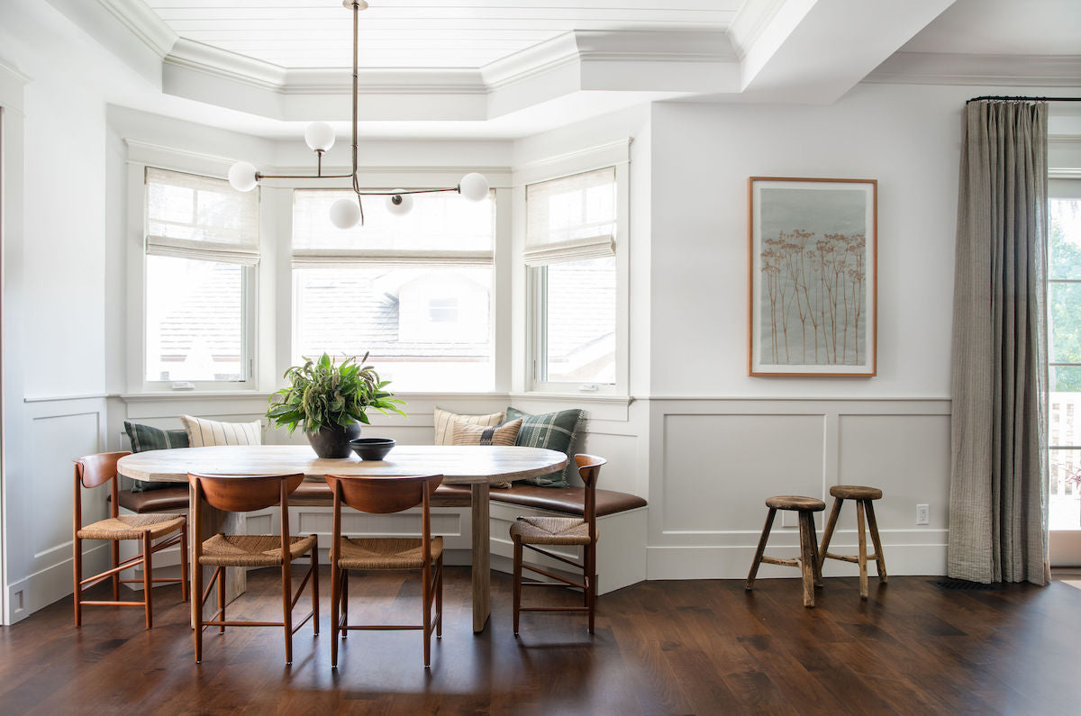 Custom carpentry including trim, wainscoting, framing, and shelving installation.