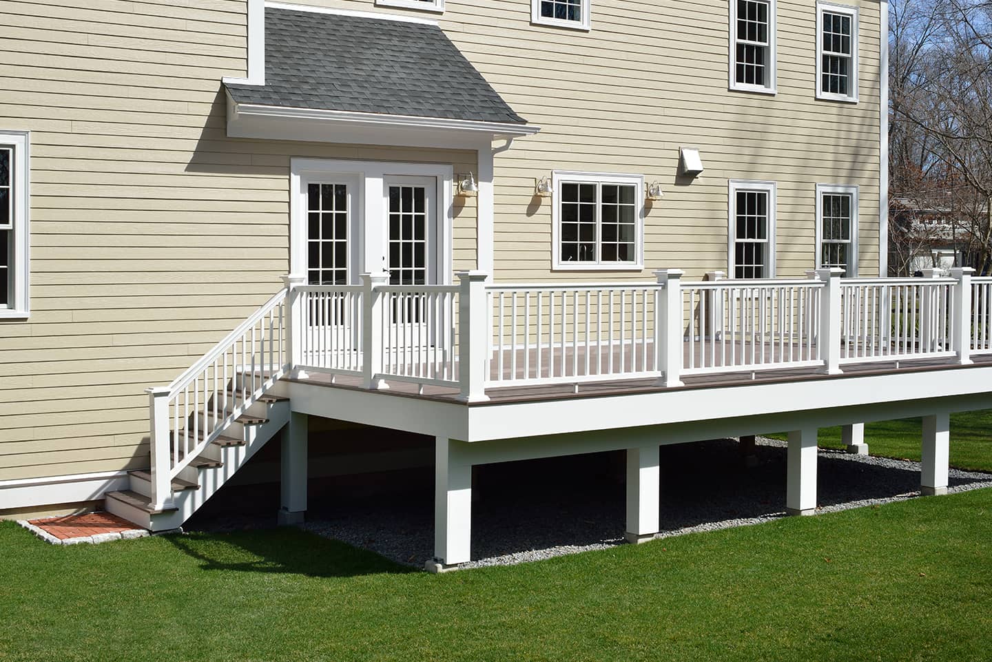 Composite deck installation with railing, stairs, and repairs in Sykesville, MD.