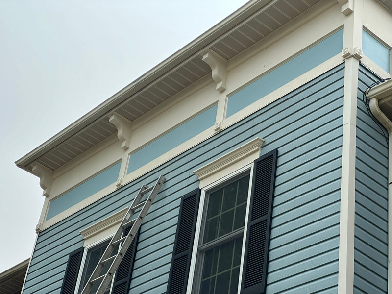 New trim, siding, and paint on parts of a townhouse in Frederick Maryland